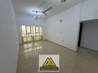 Al Muwaihat 3 One-bedroom apartment with spacious living areas and a practical design