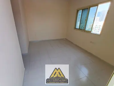 🏡 Apartment in Al Rashidiya 2 Ajman 1BR balcony central AC free maintenance 26k yearly 4 payments near Falcon Towers and Ruler Palace.