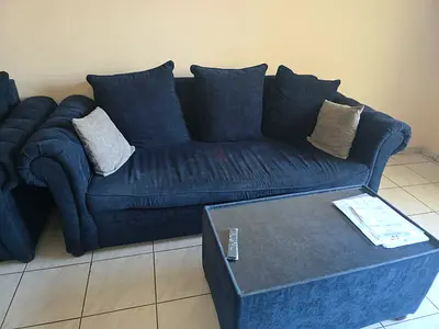 Dark blue 3-seater sofa with ottoman, good used condition