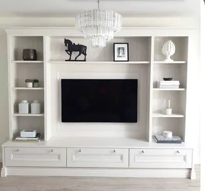 Modern White Entertainment Center with Integrated Shelving