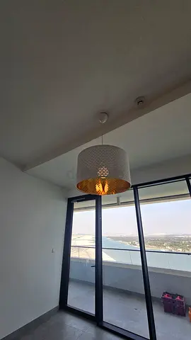 Modern perforated drum pendant ceiling light - white  gold interior