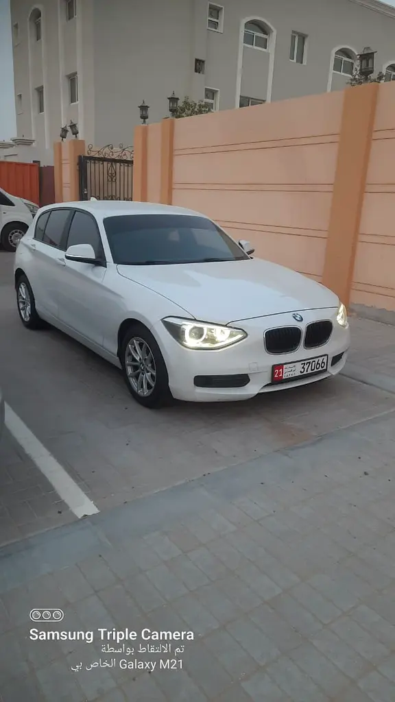 BMW 1-Series 2013 — photo 1 of 15