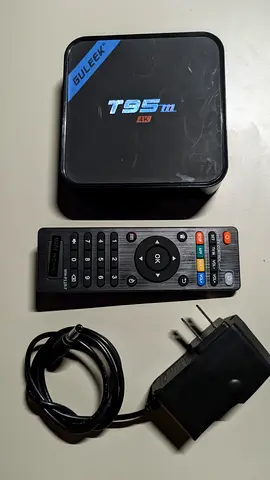 T95m 4K Android TV Box with Remote and Power Adapter