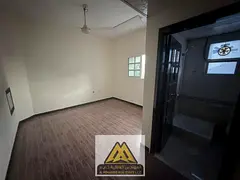 Spacious studio with central air conditioning for rent in Al Rashidiya 1, Ajman – Family building