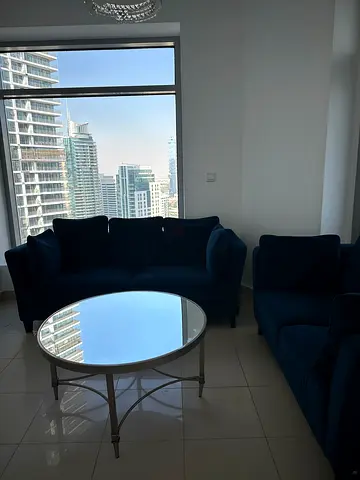 the one brand  Blue 3-Seater Sofa with and the other 2 seater and Glass Coffee Table