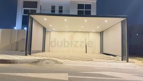 Modern covered carport / pergola with built-in lighting