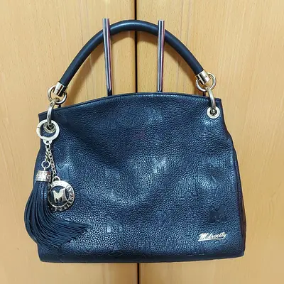 Metrocity black embossed shoulder bag