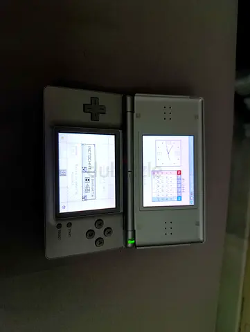 Silver Nintendo DS Lite console - working condition