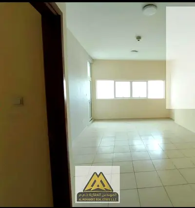 Apartment for sale, one bedroom and living room, in Ajman Towers One, 4th floor, large area, sea view