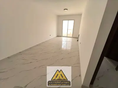 A brand-new one-bedroom apartment is available for annual rent in Al Mowaihat 1, Ajman. The apartment features a modern layout with a balcony, two bat
