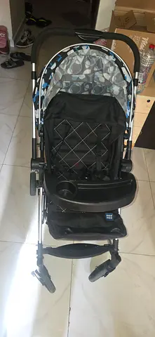 Lightweight baby stroller with snack tray and adjustable handle - good condition
