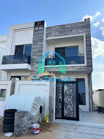 For sale in Ajman, a 6-bedroom master villa with a maid’s room, a separate living room, 2 halls, and 8 bathrooms in Al Yasmeen, 1.750 million