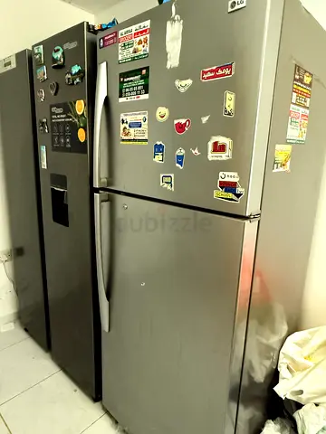 Double-door stainless steel refrigerator - good working condition