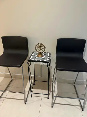 Pair of modern black leather bar stools with chrome legs - good condition