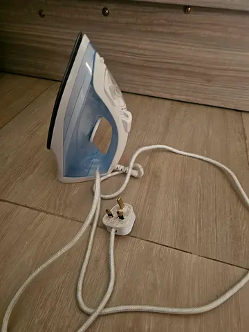 Lightweight Steam Iron with Ceramic soleplate and iron board with anti slip iron stand. Fixed price.
