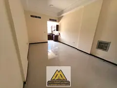 Annual spacious studio for rent in Al Mowaihat 1, Ajman. Ground floor, semi-separate kitchen, centra