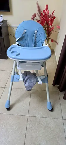 Light blue baby high chair with removable tray - good condition