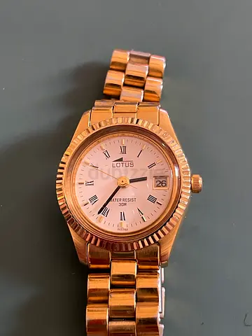 Lotus gold-tone womens wristwatch with date display