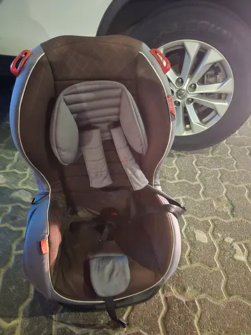 Used infant car seat, adjustable harness