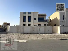 Corner villa for sale in Ajman, Al Helio area, including registration fees. 4 master bedrooms, majli