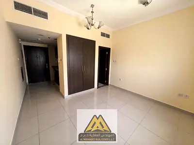 It is located in Al Rawda 1 area inside a clean and upscale building, and it is close to all services, with easy access to Sharjah and Dubai.