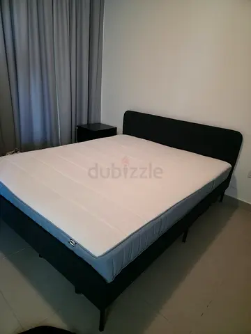 Queen bed frame with mattress - good condition