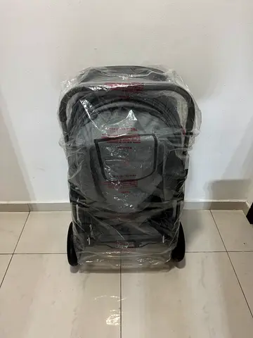 Lightweight foldable baby stroller - compact and unused (still wrapped)