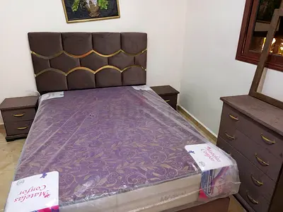 Large bed with drawers on both sides and a dresser in excellent condition, used for less than month