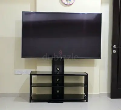 TV stand with table, holds up to 65 inches (new)