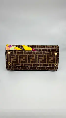 Brown monogram clutch/waist bag with gold studs and patterned trim