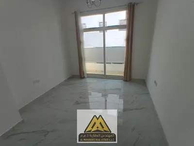 One-bedroom apartment with living room in Al Jurf 3, Ajman. Central AC, balcony, 2 bathrooms, closed kitchen, prime location near the Chinese Market.