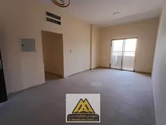 A one-bedroom apartment for annual rent in Al Rashidiya 2, Ajman, featuring a balcony, spacious layo