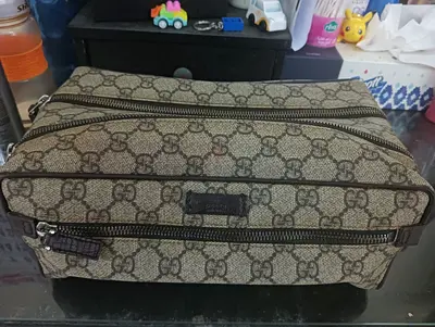Gucci monogram canvas dopp kit / toiletry bag