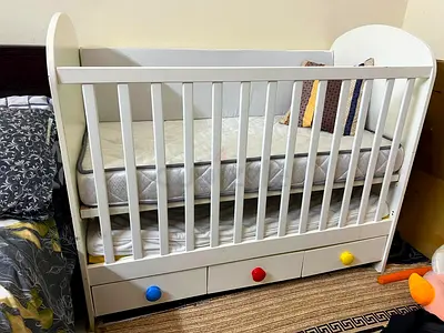 White Wooden Baby Crib with Storage Drawers - Good Condition