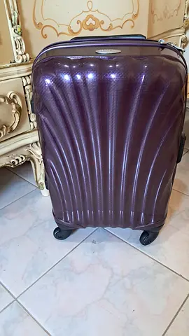 Semsonite Hard-shell purple spinner suitcase - cabin size, 4 wheels