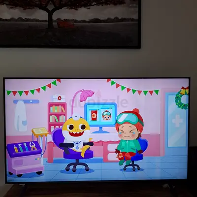 LG LED TV (model 75UQ80006LD) - Back Panel View, Good Working Condition