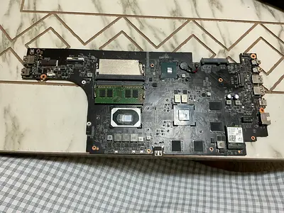 Used laptop motherboard with 8gb DDR3 RAM slot and CPU socket with Intel WiFi card