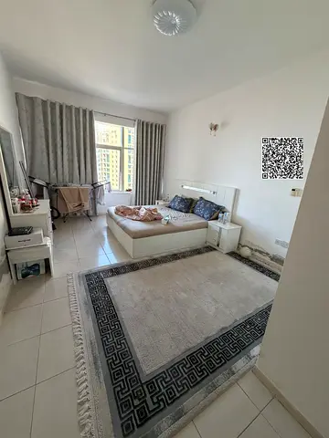 bedroom apartment with a living room for sale in Horizon Towers – Ajman Direct view of Ajman Creek