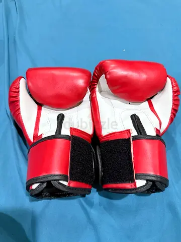 Red and white boxing gloves with wrist support – used, good condition