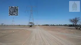 Corner plot of land in Manama 13, close to the road