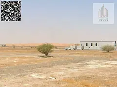 Land for sale in Manama - Corner plot for sale in Manama 11 - The land is close to the main road - L