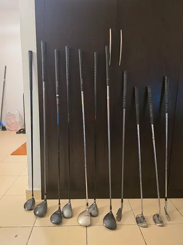 Set of Various Golf Clubs