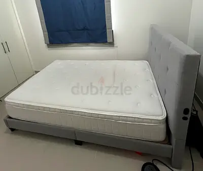 Grey fabric double bed frame with mattress - good condition