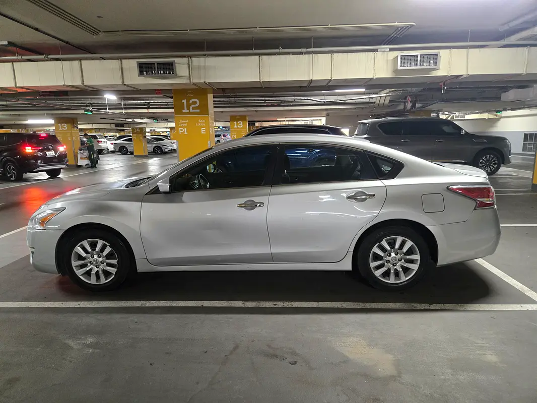 Nissan Altima 2014 — photo 1 of 5