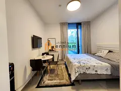 A stylish studio with a balcony, high-end furnishings, and a stunning pool view!!!
