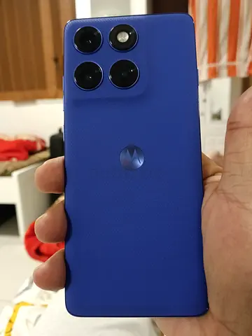 Motorola blue smartphone - good condition, triple camera