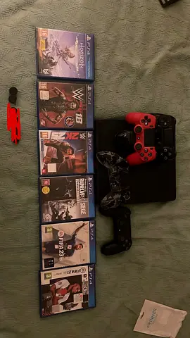 PlayStation 4 console with 3 controllers + 7 games (good working condition)
