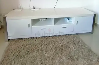 White TV Entertainment Unit with Storage - Good Condition
