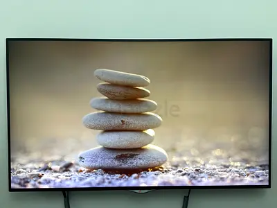 55-inch LG LED TV - Wall Mounted, perfect Condition.