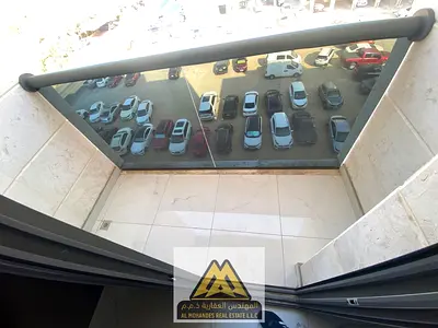 A spacious one-bedroom apartment in a new building, second occupancy, in the Al Hamidiya area, close to the Ajman Court, Ajman University